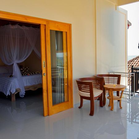 Ganesha Amed Hotell Rum bild