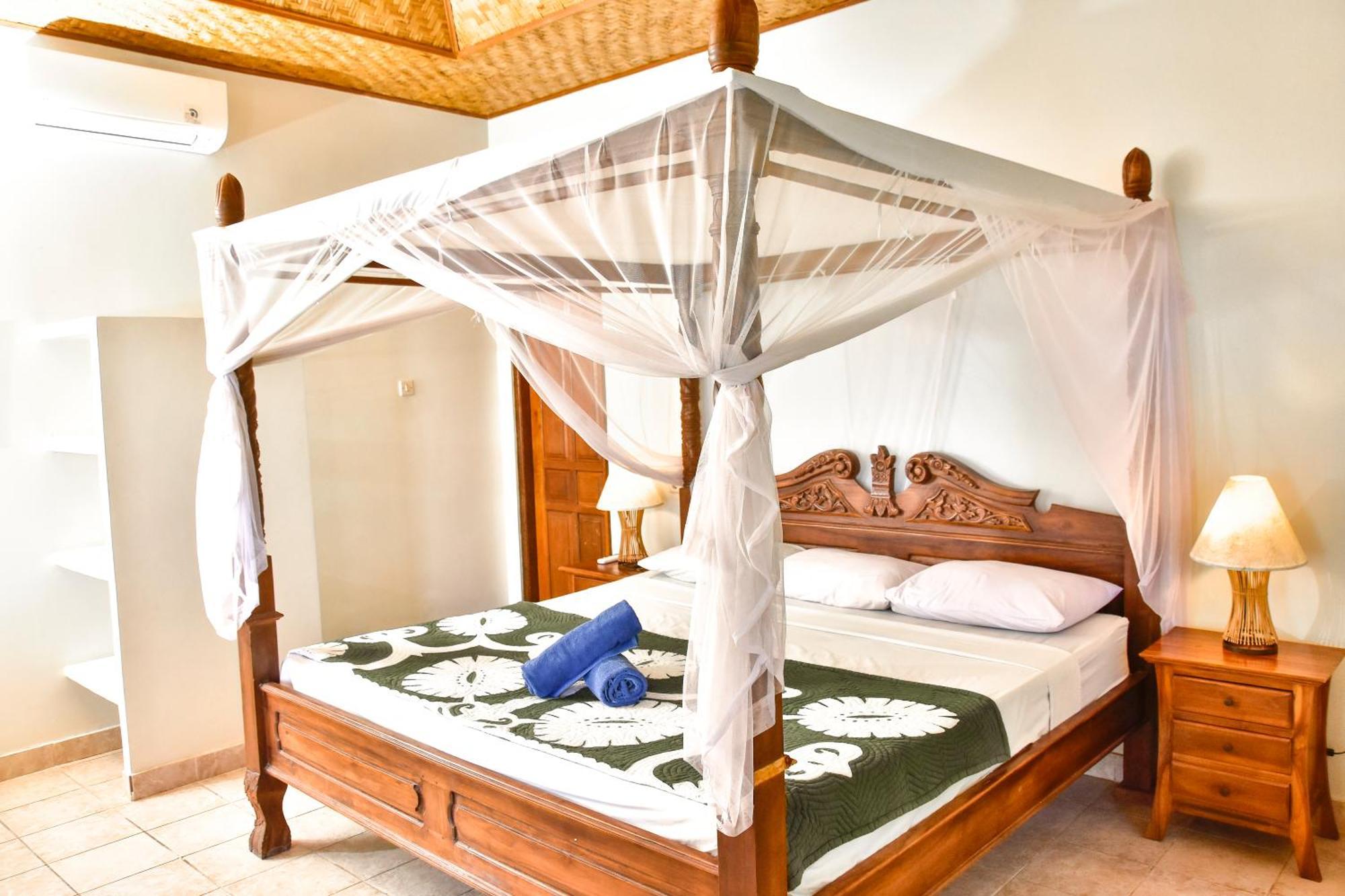 Ganesha Amed Hotell Rum bild