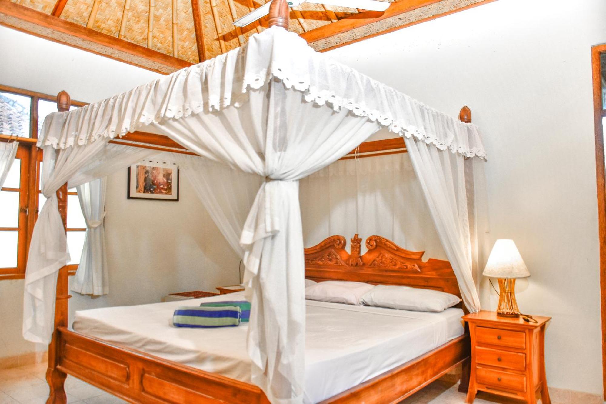 Ganesha Amed Hotell Rum bild