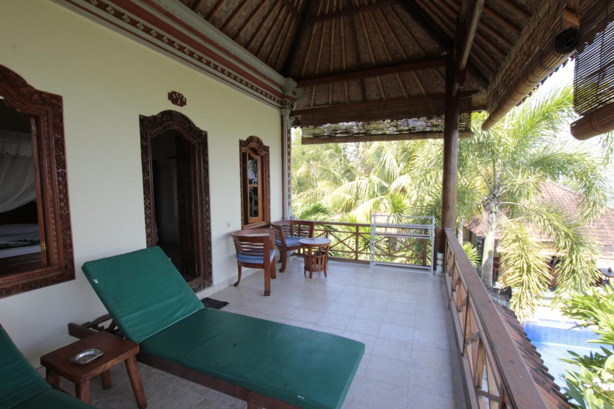 Ganesha Amed Hotell Rum bild