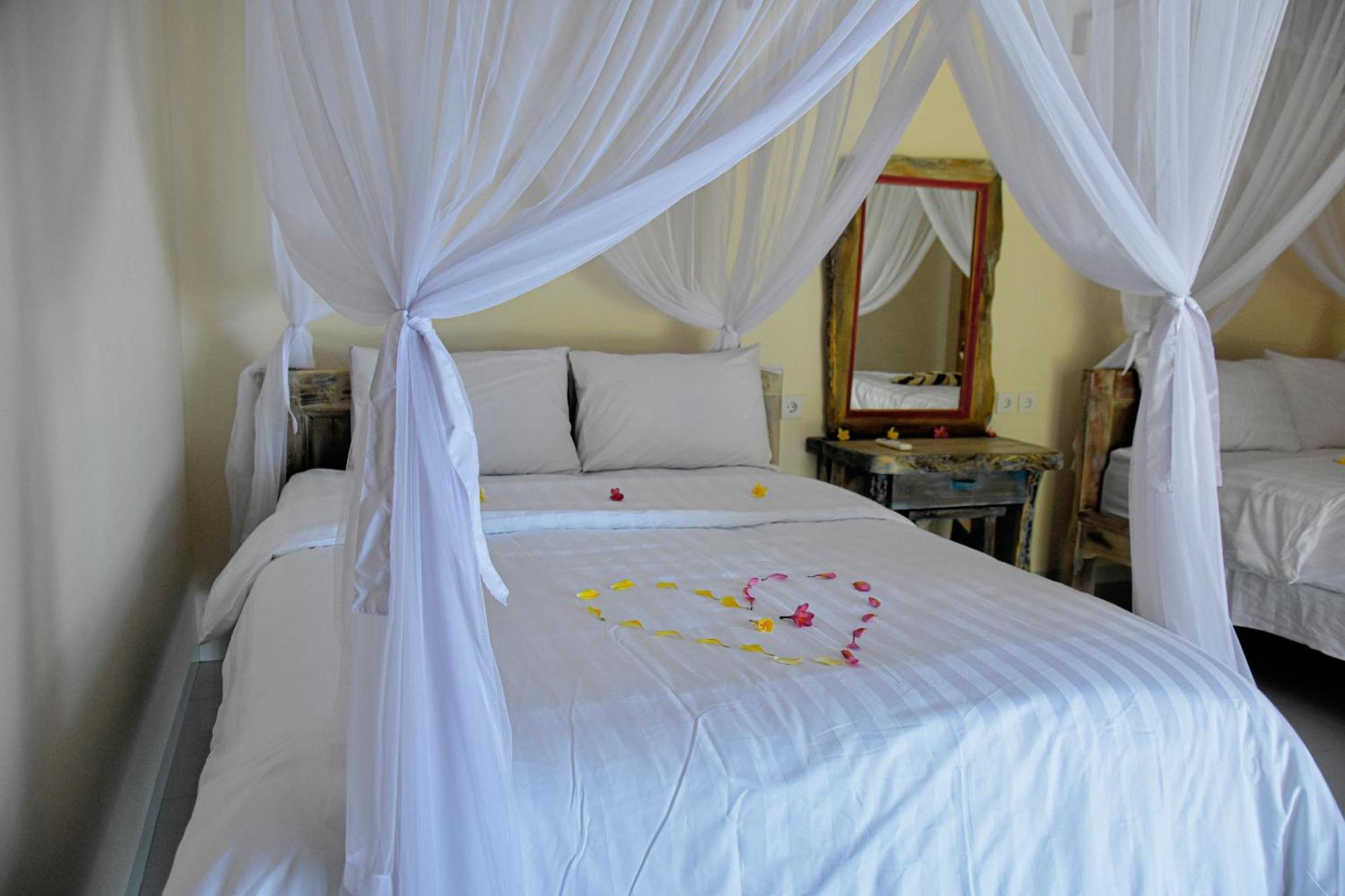 Ganesha Amed Hotell Rum bild