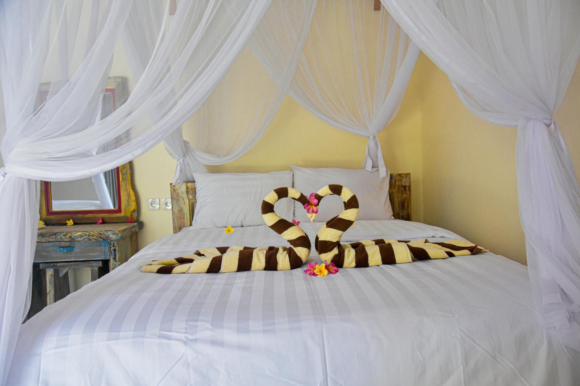 Ganesha Amed Hotell Rum bild